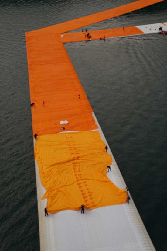art installation, fabric covered floating piers by Christo and Jeanne-Claude