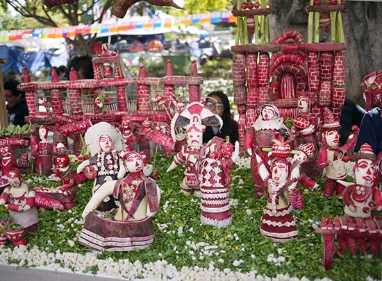 figures carved from radishes in a radish carved environment
